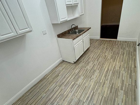 5th image of 341 E 19th St APT 3