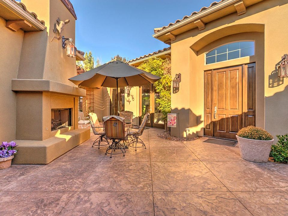 Outdoor courtyard with fireplace
