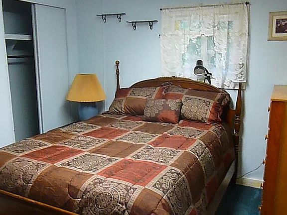 Full size bed.  1/2 bath is adjoining this room