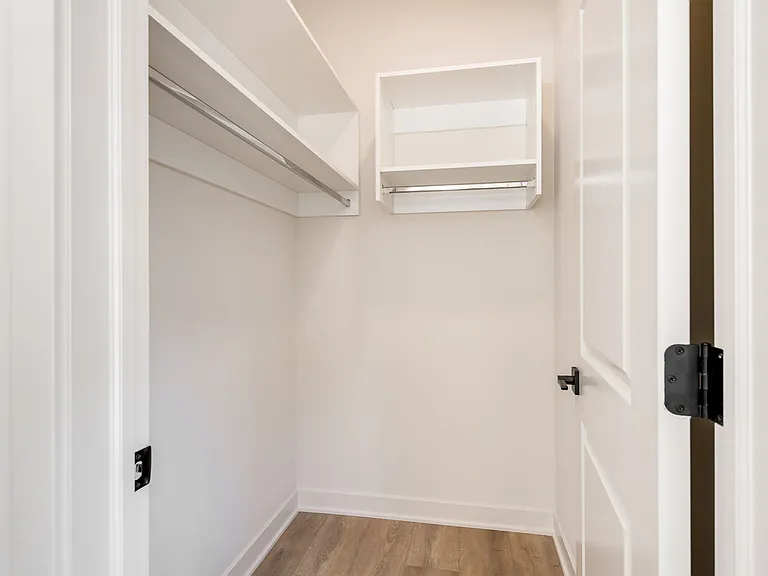Walk-in Closets with Custom Shelf Organizers