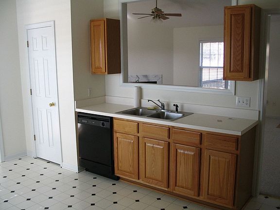 Kitchen looking into living room