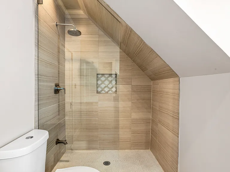 2nd Floor Bathroom accessible by hallway and from Primary Bedroom