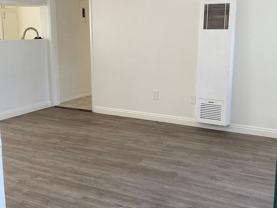 View of living room from front door entrance.