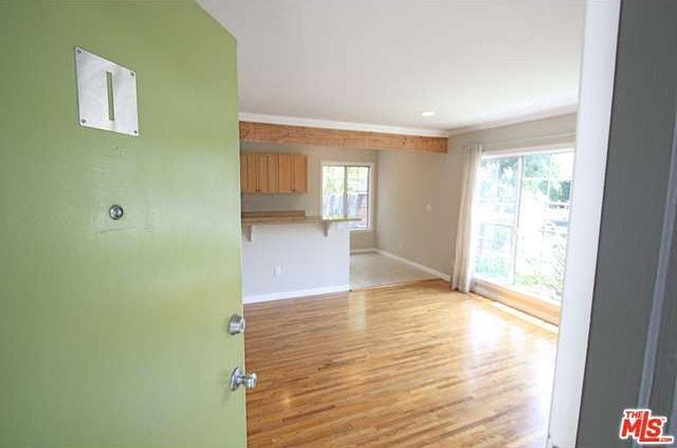 Welcome! Hardwood floors in the living room and bedrooms. Huge living room picture window.