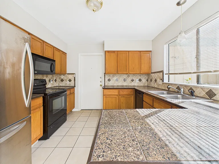 9520 Quail Village Ln — Photo 17