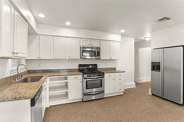 6151 Charlotte Dr — Photo 7