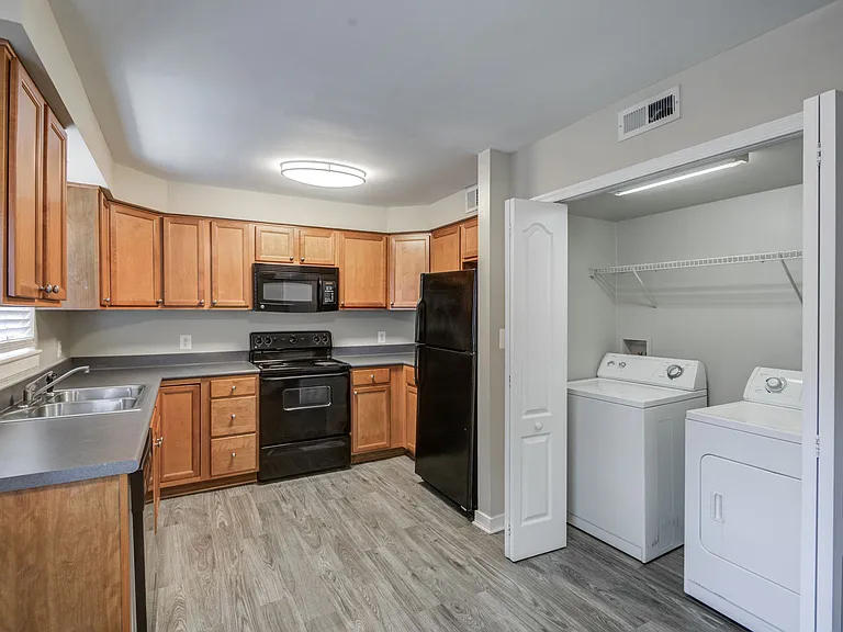 Maple Bay Apartment Townhomes — Photo 1