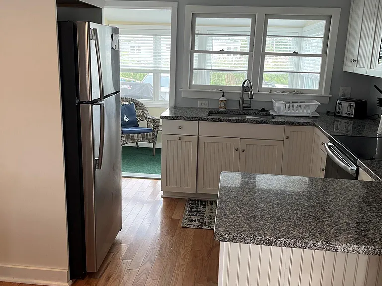 kitchen with all new appliances and granite counter tops