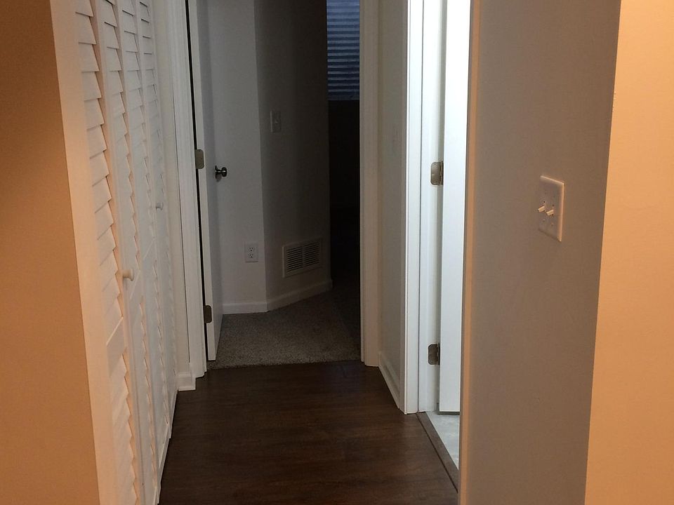 Laundry room area and main floor bedroom.