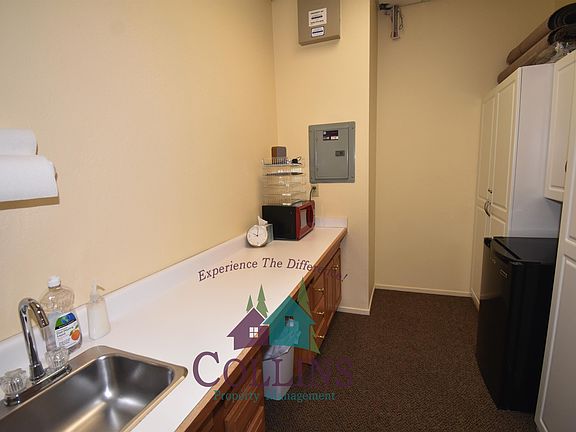 COMMON AREA BREAK ROOM IN HALL. STORAGE LOCKER FOR YOUR OFFICE, MINI FRIG, SINK, AND MICROWAVE.