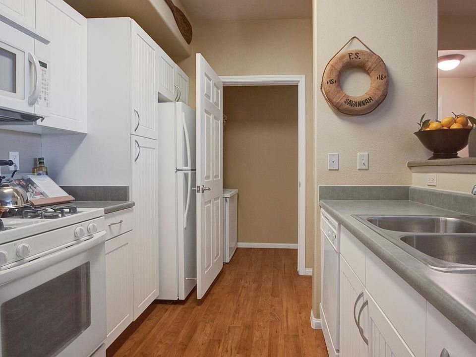 Galley Style Kitchen with Laundry Room just steps away