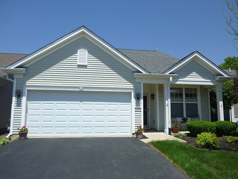 Great curb appeal with many perennials, cozy front porch