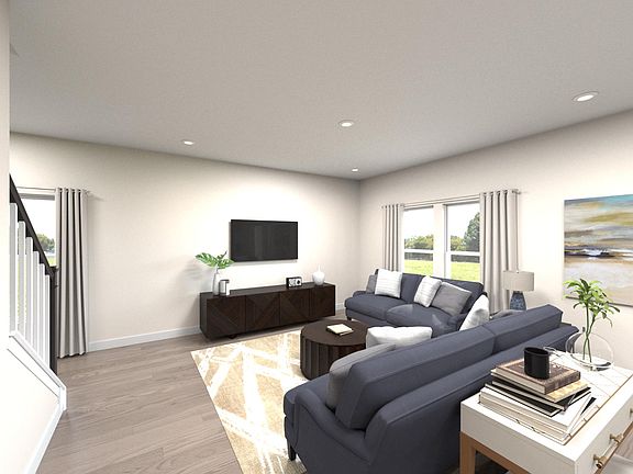 Enjoy family movie nights or cheer on the big game in the bright, open family room.