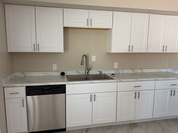 New dishwasher and cabinets