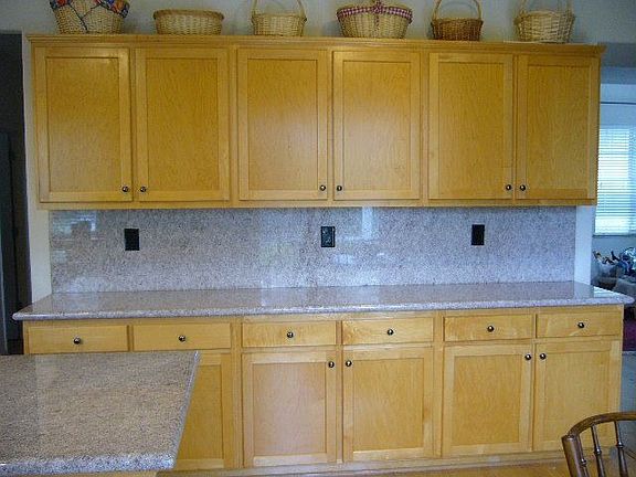 additional kitchen counter space and cabinets