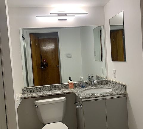 Hall bathroom with Shower.