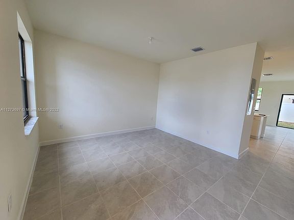 2nd image of 11466 W 33rd Way #11466