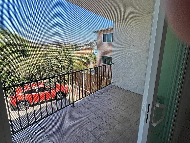 large covered patio; no neighbors directly behind building