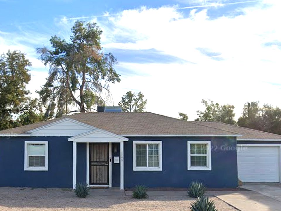 Low maintenance front yard, covered parking in garage.