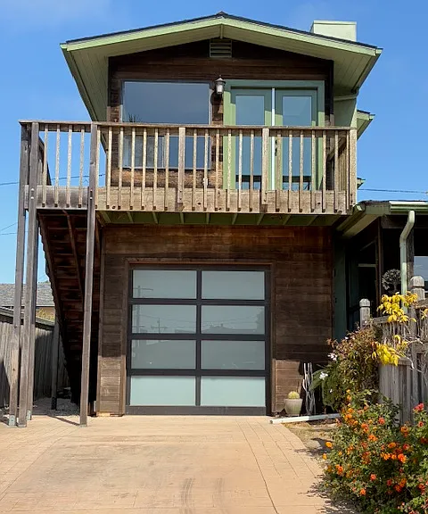 Front of house rental is upstairs unit and garage