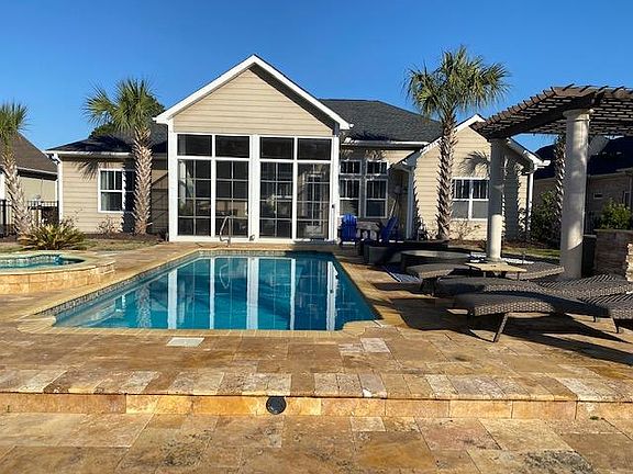Pool area in backyard