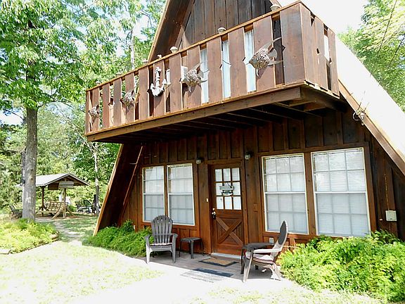 All front windows and the second floor deck have lake views to enjoy. Please note the swing under ro