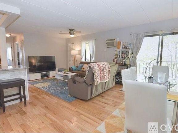 Personal balcony allowing natural light in while also providing privacy.