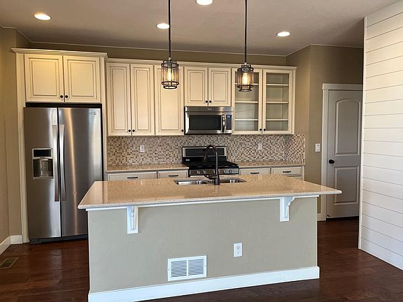 Main Floor: Kitchen view, shiplap dining room accent wall