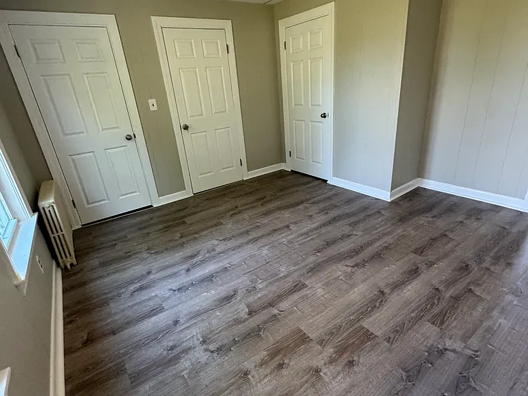 Primary bedroom with 3 closets