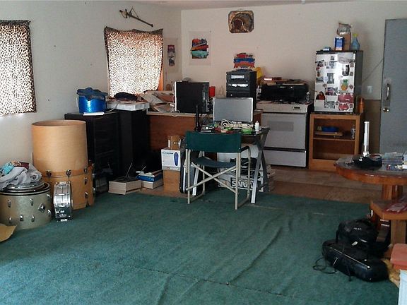 Great room in loft looking to rear with a kitchenette possibility
