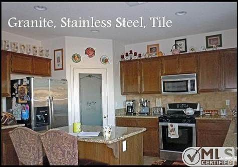 center island is a great place for snacks, favorite beverage