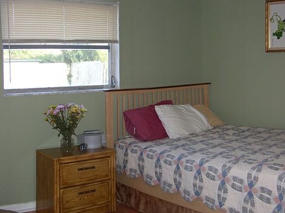 Master Bedroom Features Wood Floors