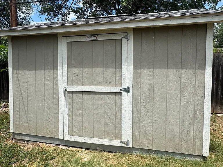 Large Tuff Shed in backyard.