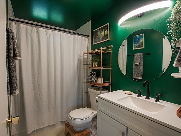 Full bathroom in the hallway with tub/shower combo.