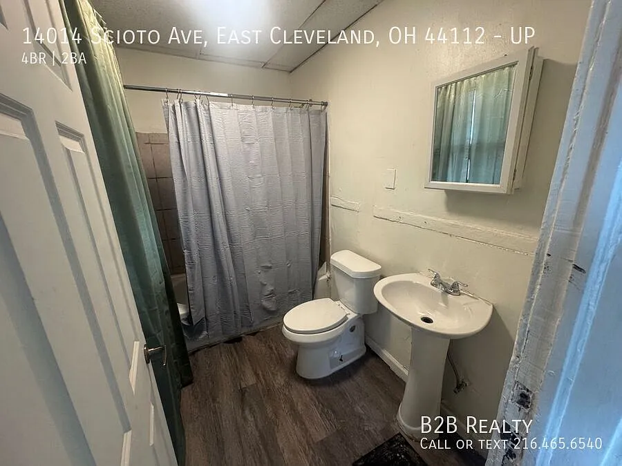 Spacious Four-Bedroom Unit in a Charming Multifamily Property Available Now! — Photo 2