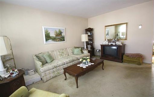 FORMAL LIVING RM W/HARDWOOD FLRS THRU-OUT