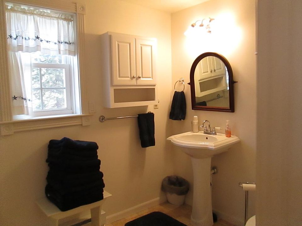 master bath with shower/ washer & dryer