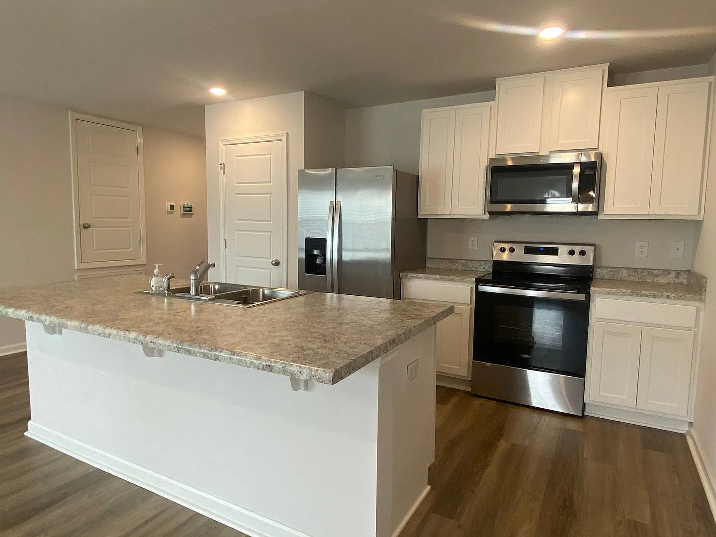 Efficient 4BR Living with Fenced Yard & Convenient Access — Photo 4