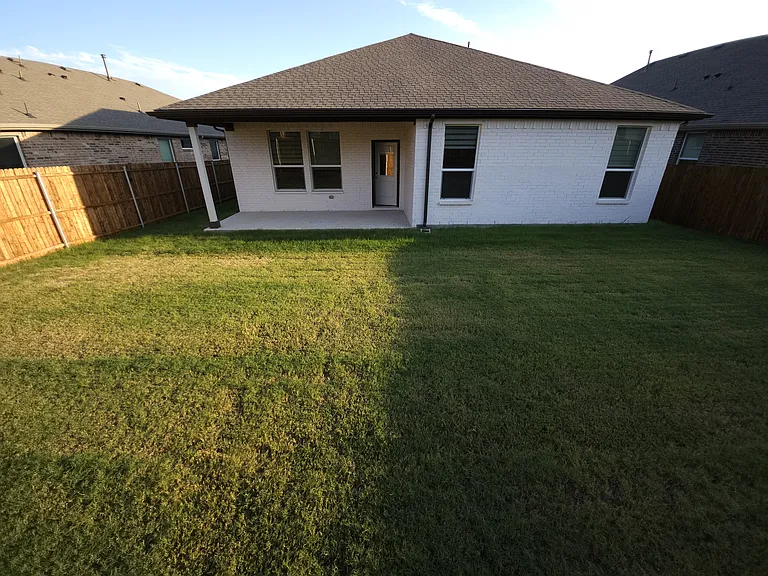 Spacious Back Yard With Covered Patio