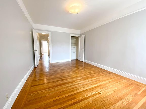 Bedroom 1 w/ custom closets