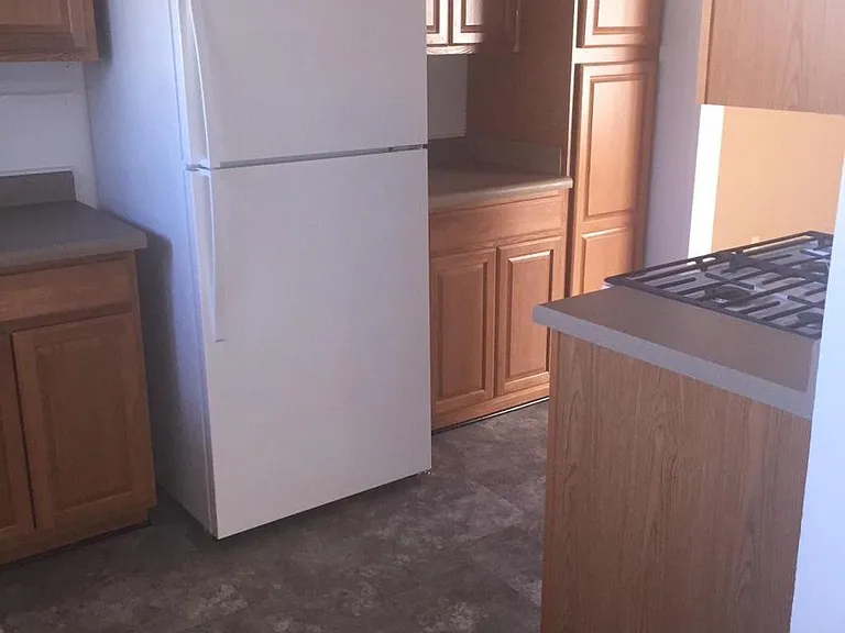 Littlefield Loop kitchens have been recently renovated with new countertops, appliances and flooring.
