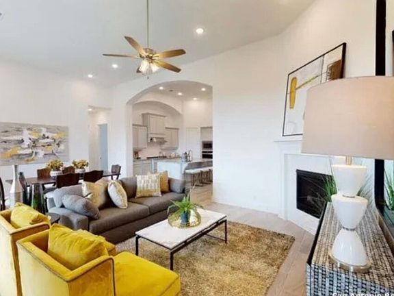 Living room and Dining area with a gas fireplace.