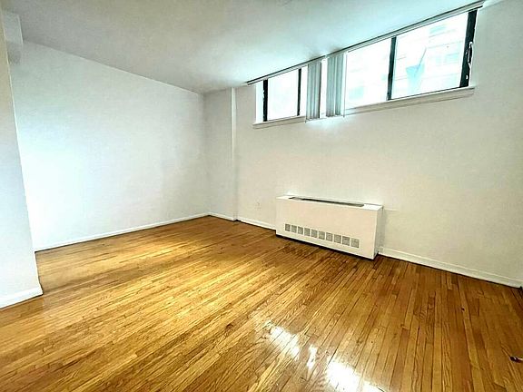 2nd image of 121 E 12th St APT 2A