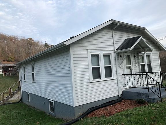 Front and side view of house.