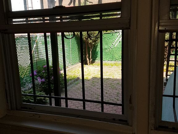 4th image of 10217 Lewis Ave #1