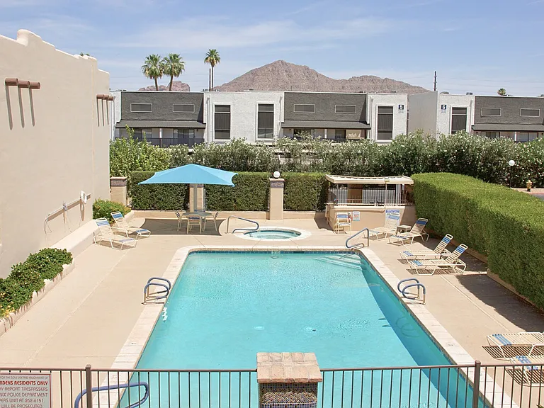 Views of Camelback Mountain & the community pool from the primary balcony