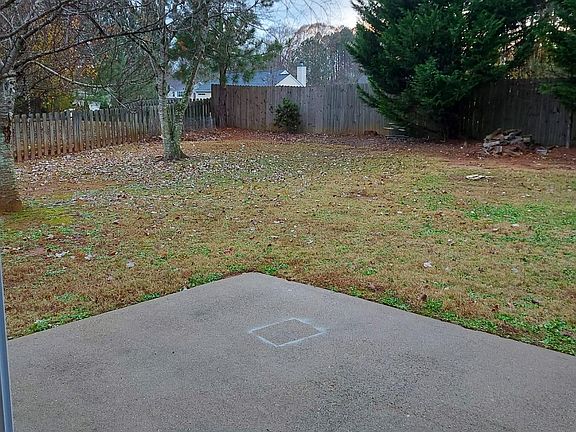 Large private backyard with double patio