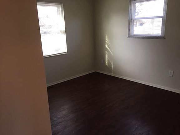 Master bedroom with private half bathroom
