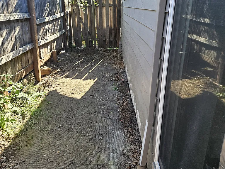 fenced patio area for each apartment