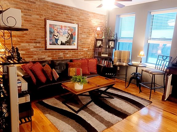 Living Room...Beautiful Italian Leather Couch, Collectable Art